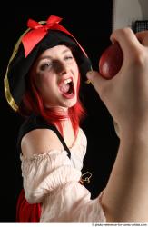 DARINA STAANDING POSE WITH APPLE